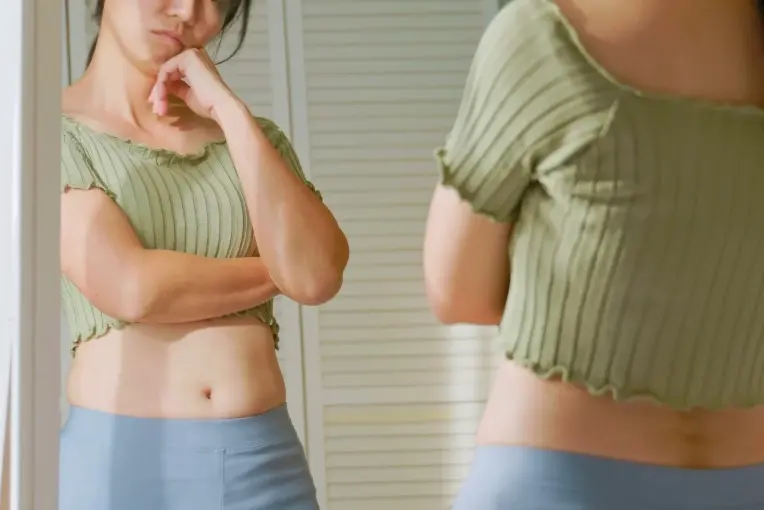 体型の悩みを持つ女性